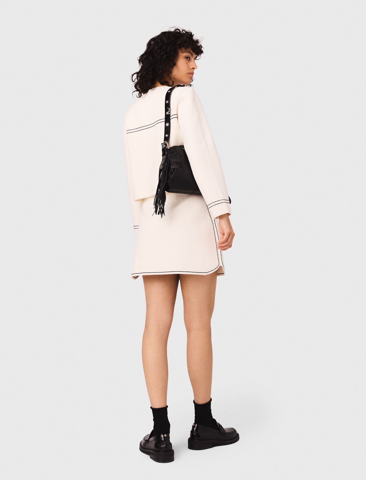 Short topstitched knit skirt