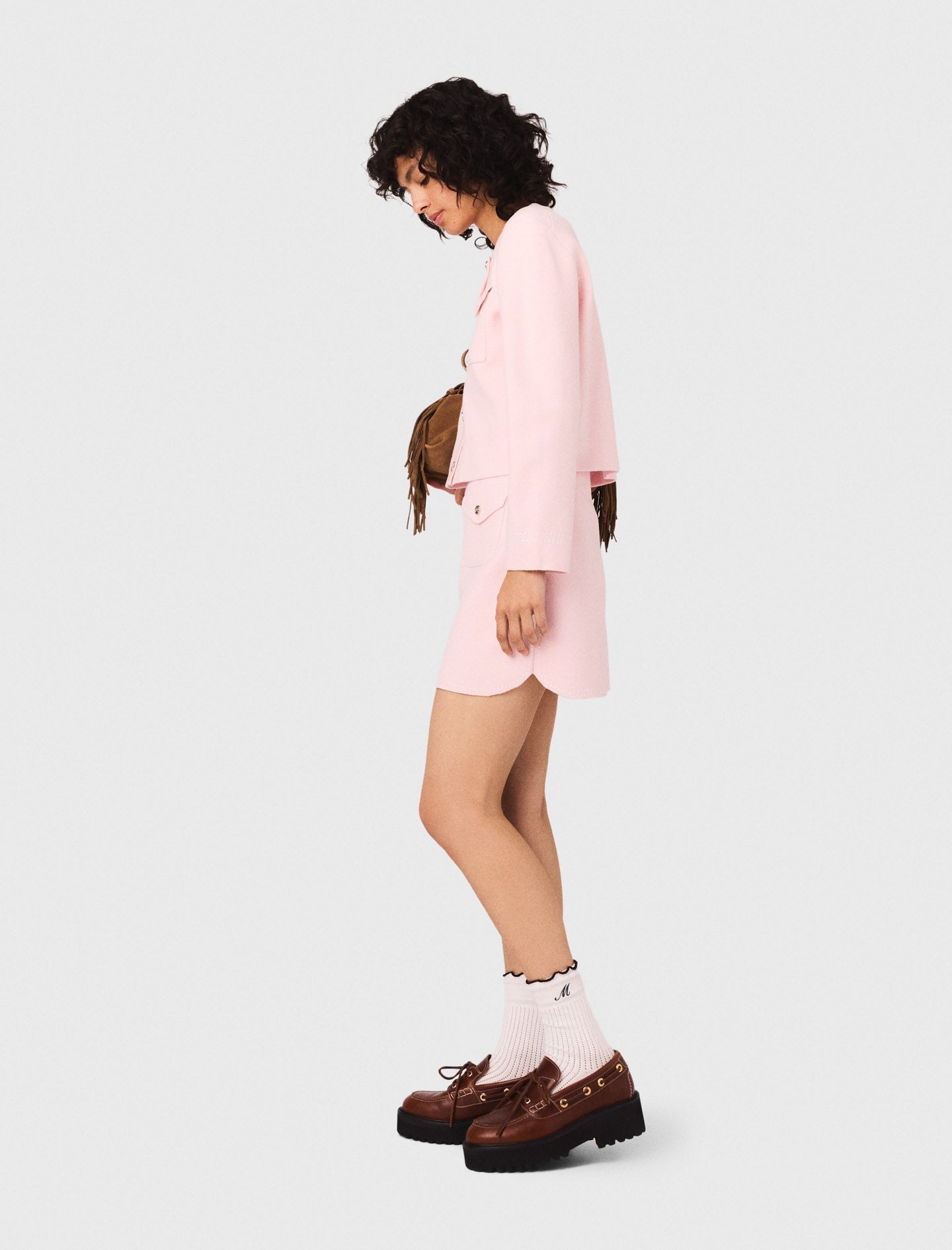 Short topstitched knit skirt