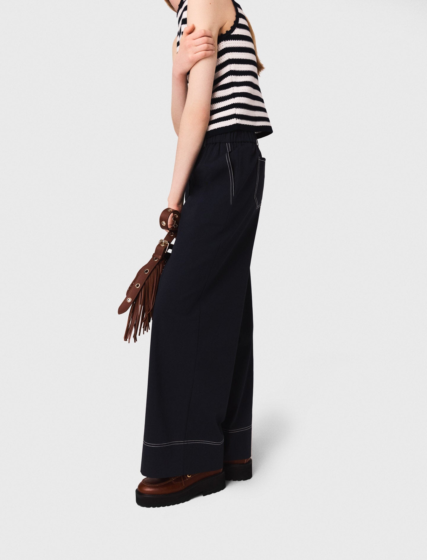 Cotton trousers with leather belt