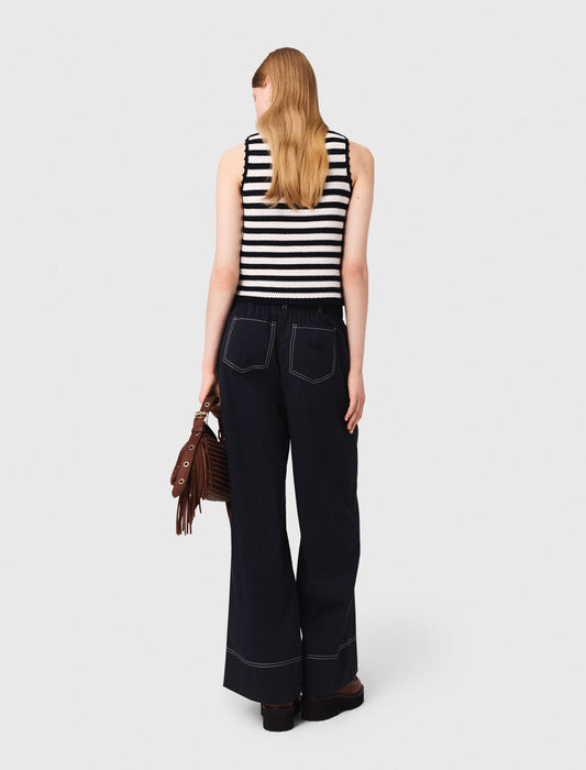 Cotton trousers with leather belt