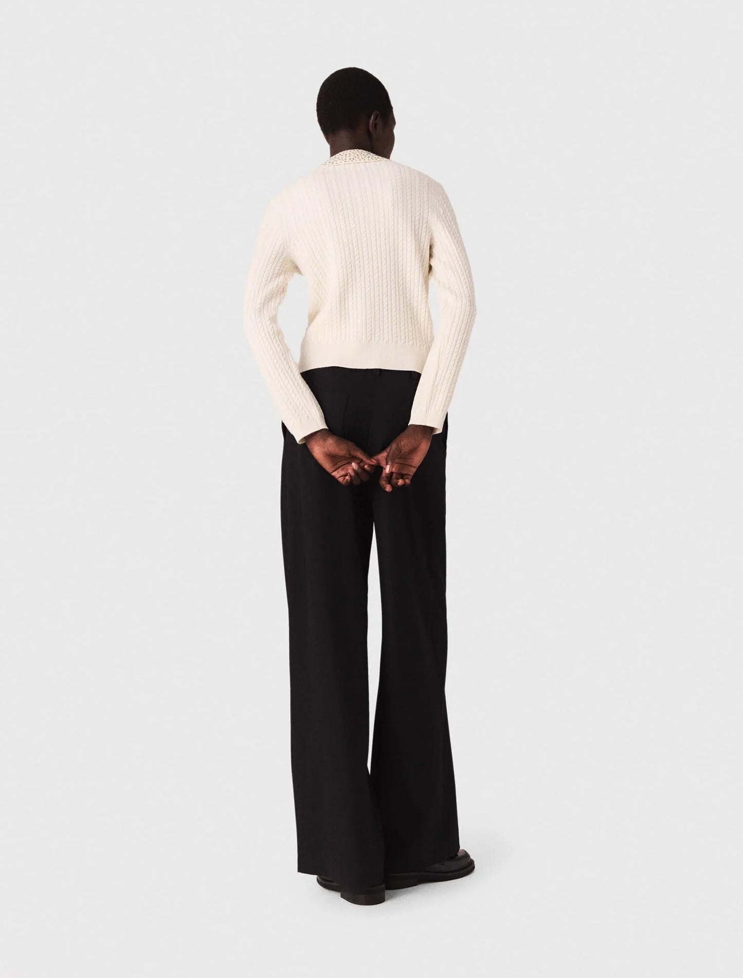 Knit polo shirt with rhinestone collar