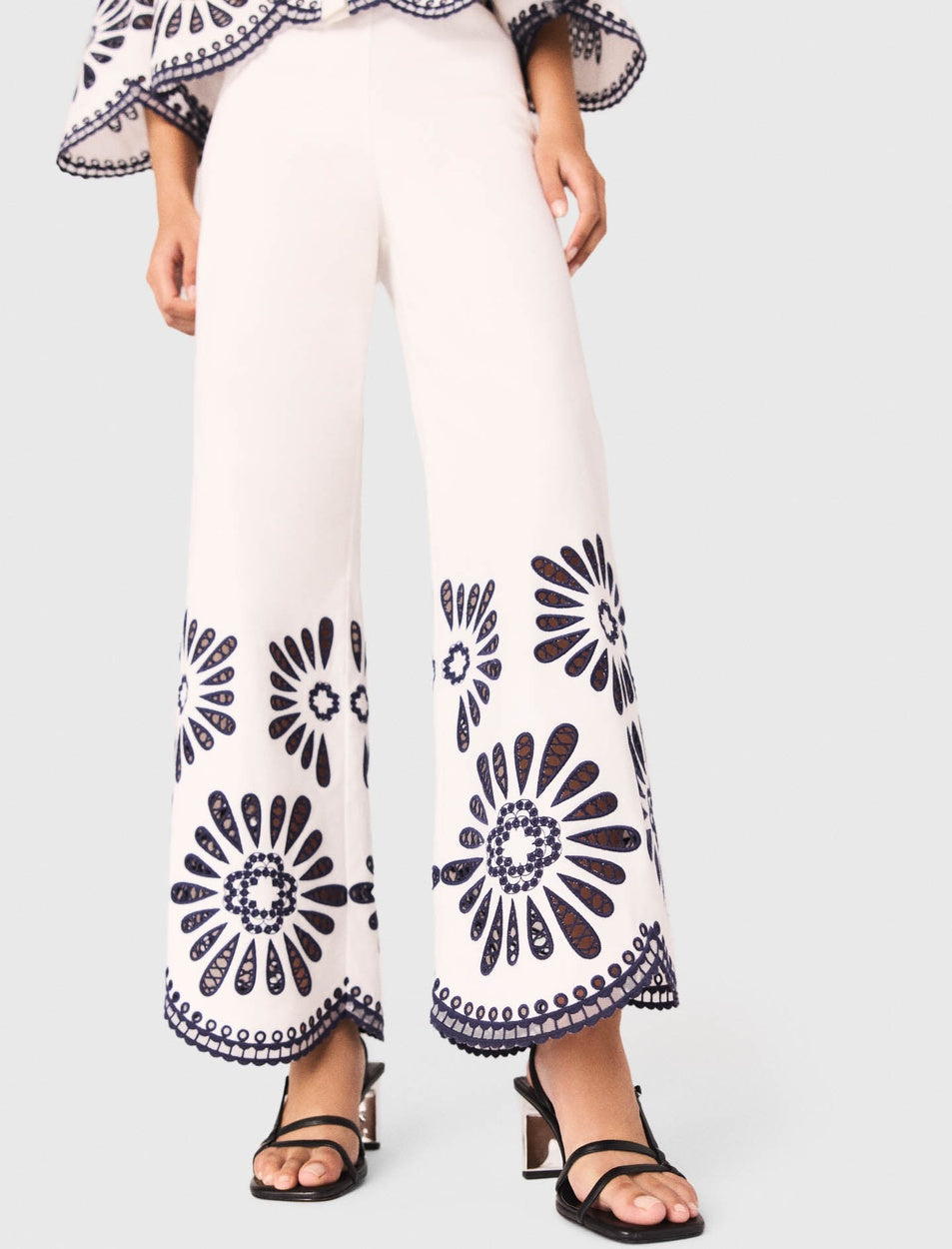 Trousers with crochet detail