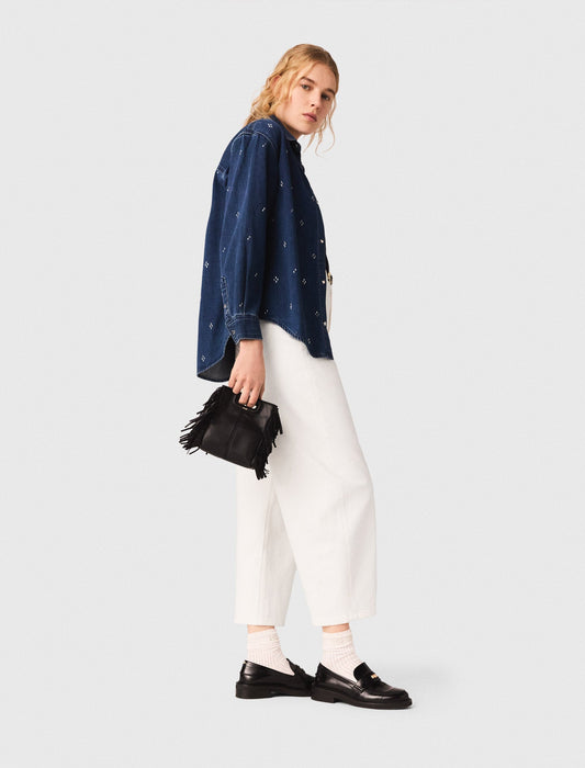 قميص دنيم مزين بأحجار الراين