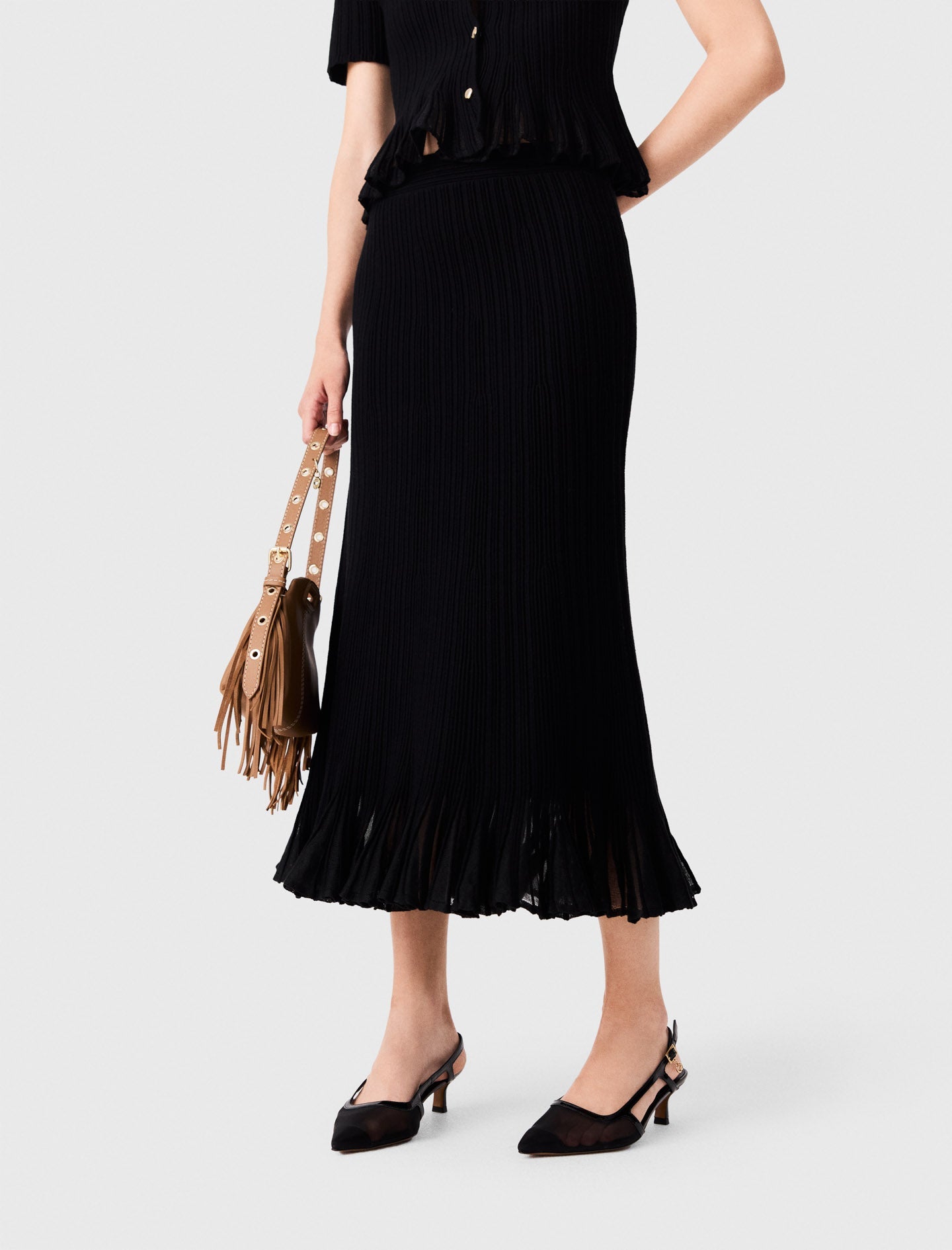 Knit skirt with peplum hem Black