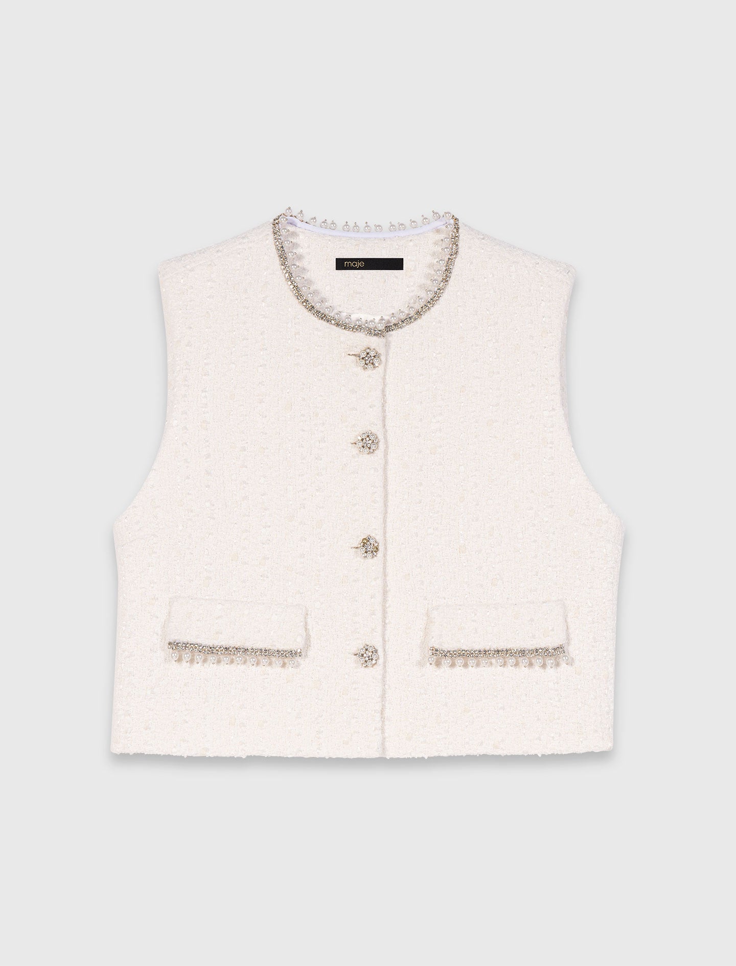 سترة تويد مزينة بالخرز باللون البيج